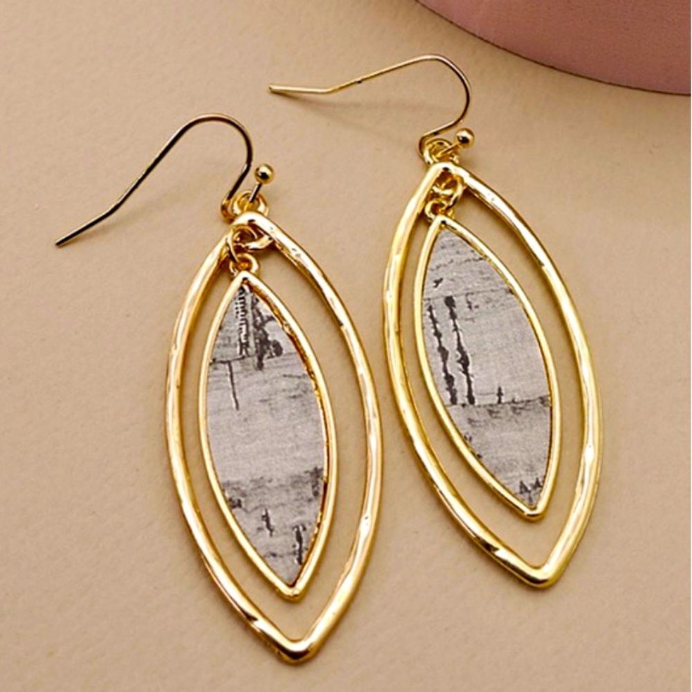 Ivory Leaf earrings with natural cork gold flecks that looks like a teardrops
